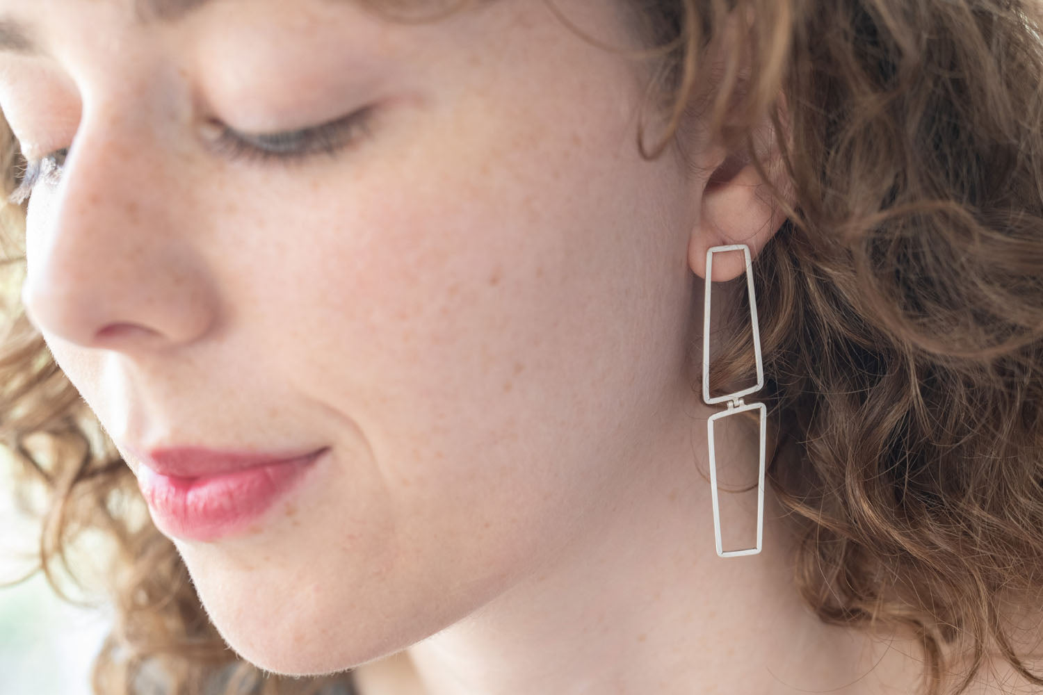 Double shape earrings