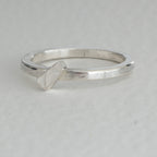 Plain band ring with embossed detail