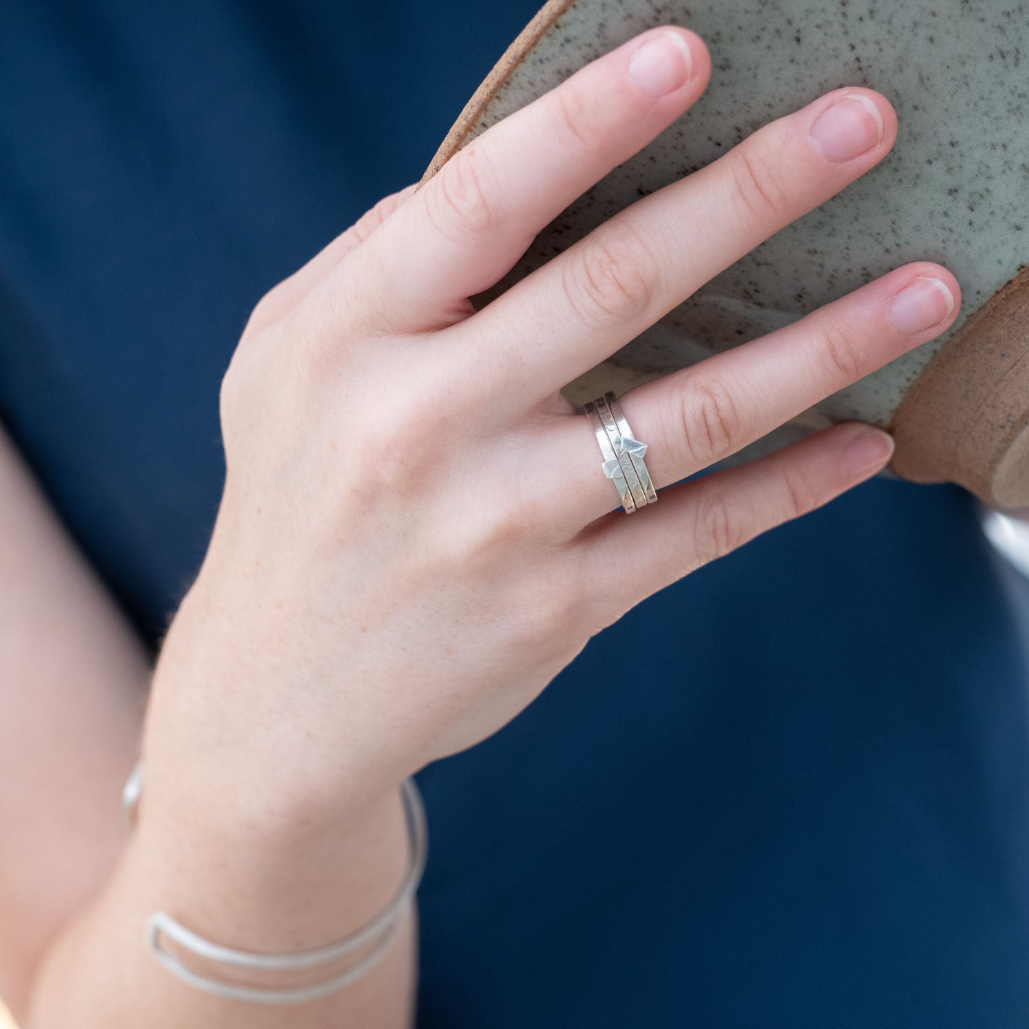 Plain band ring with embossed detail