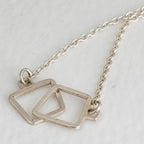 Double link pendant