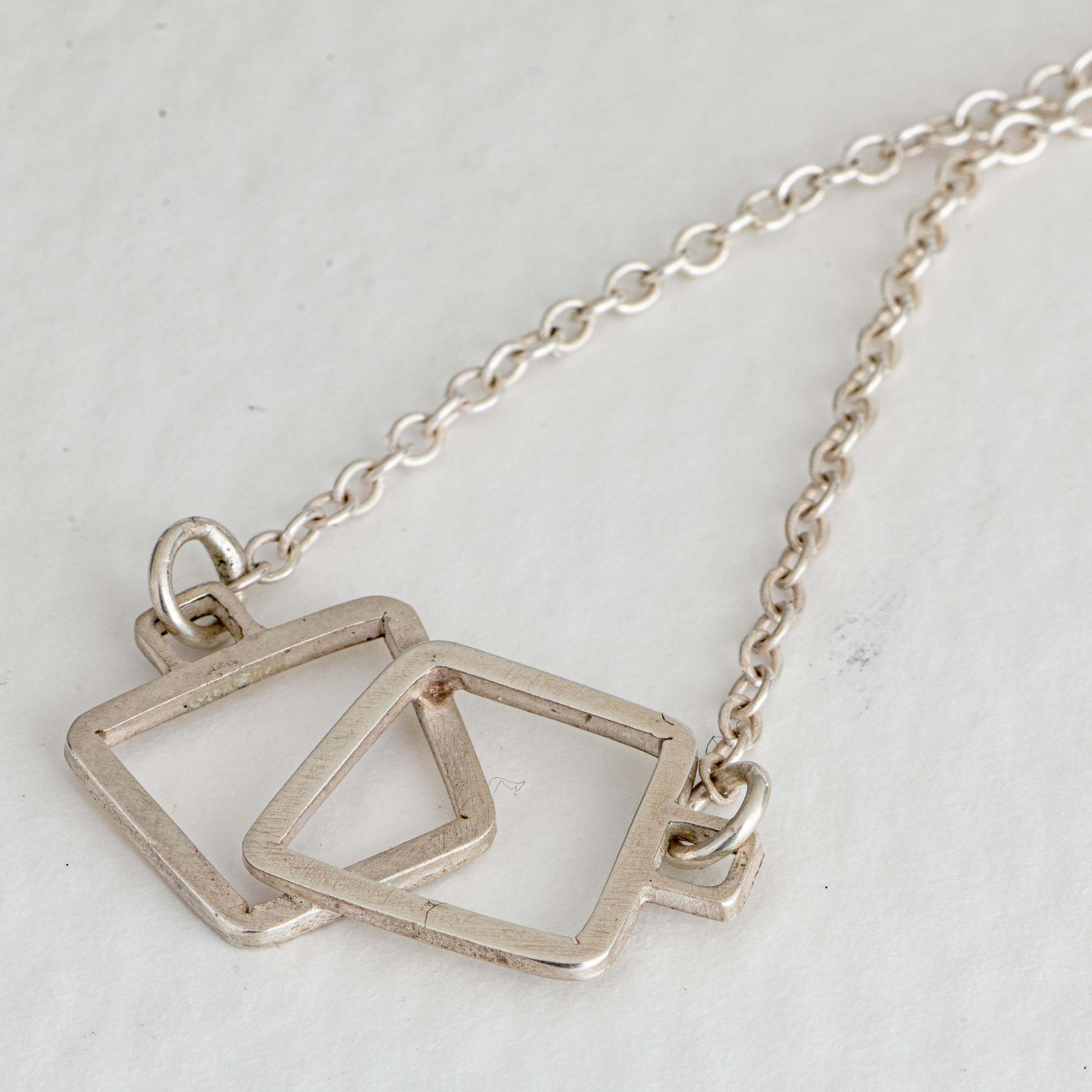 Double link pendant