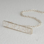 Silver strut pendant